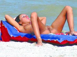 Beach Spy Eye - spread legs on a beach