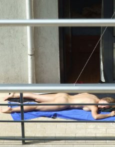 nude sunbathing at Fortunate Voyeur Moments