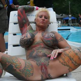 Extreme tattoed mature